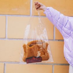 Woman working on wall