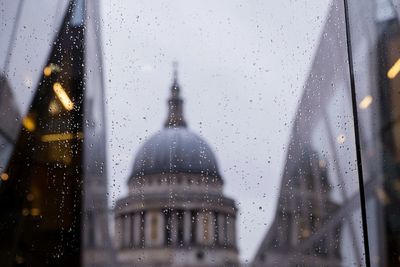 Close-up of wet glass window in rainy season