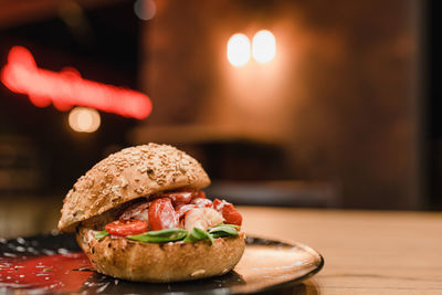 Close-up of burger on table