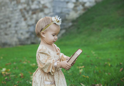 Portrait of young woman using mobile phone