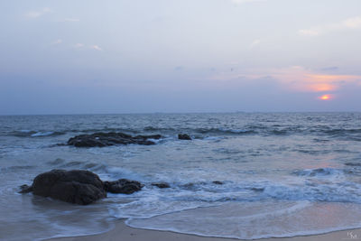 Scenic view of sea against sky during sunset