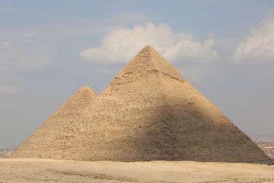View of castle against cloudy sky