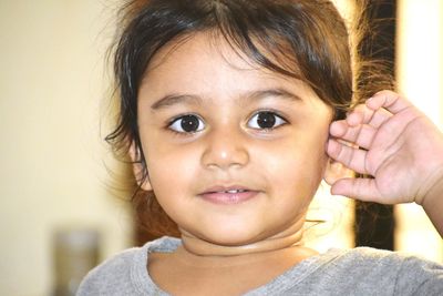 Close-up portrait of cute girl