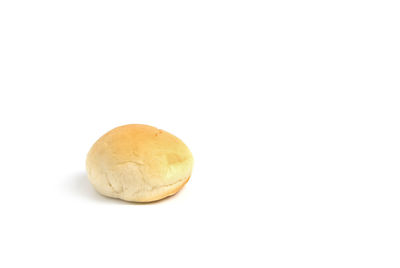 Close-up of bread against white background