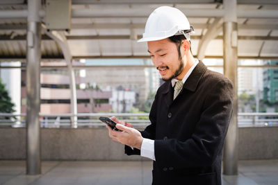 Young man using mobile phone