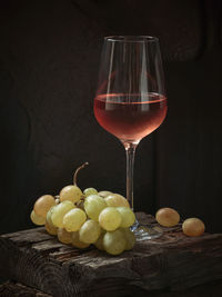 Close-up of wineglass on table