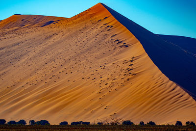 Scenic view of desert against sky