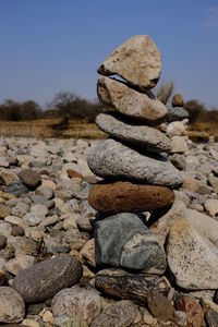 Close-up of stone stack on rock