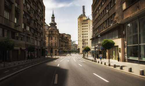 View of city street against sky