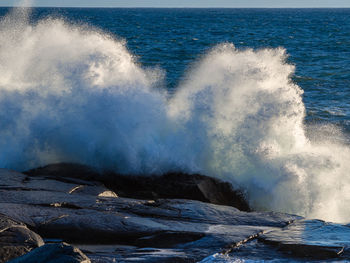 Waves splashing on rocks