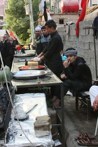 People at market stall