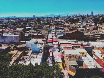High angle view of buildings against clear sky