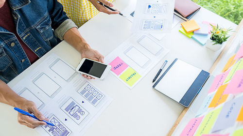 Cropped image of business colleagues working in office