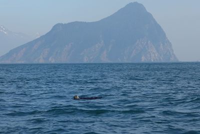 Scenic view of sea and mountains