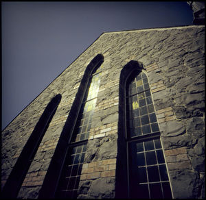 Low angle view of building against clear sky