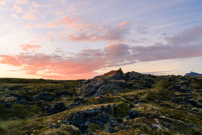 Scenic view of landscape against sky during sunset