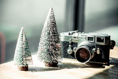 Close-up of camera on table