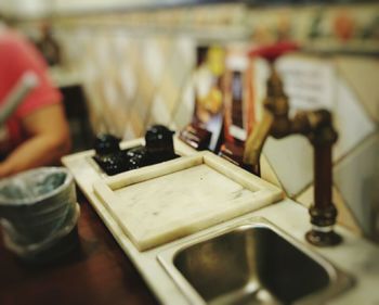 Close-up of mannequin on table