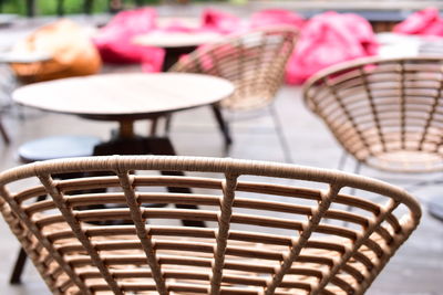 Empty chairs and tables in cafe