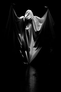 Extreme close up of hair over black background