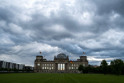 View of historic building against cloudy sky