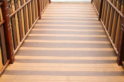 High angle view of wooden footbridge