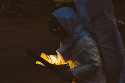 Rear view of man in work suit