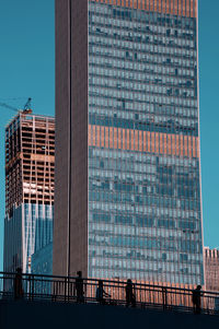 Buildings in city against sky