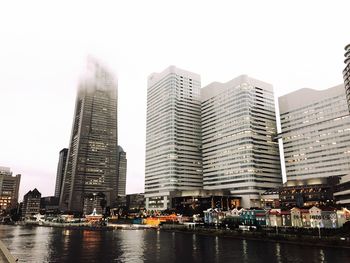 Low angle view of skyscrapers against clear sky