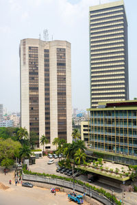 Buildings in city against sky