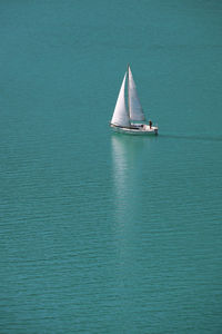 Sailboat sailing on sea