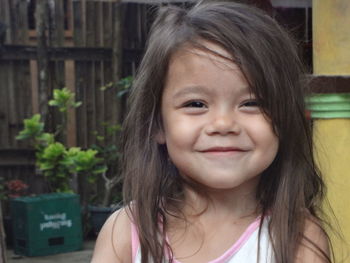 Close-up portrait of smiling girl