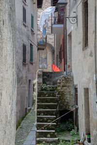 Alley amidst buildings in city