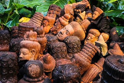 Close-up of old abandoned damaged buddha statues