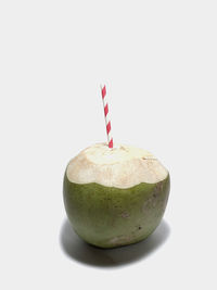 Close-up of apple against white background