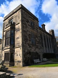 Low angle view of old building against sky