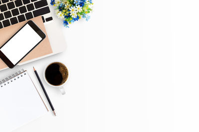 High angle view of coffee cup on table