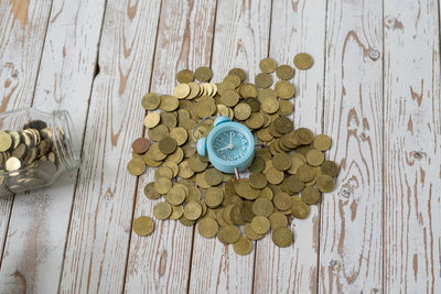 High angle view of coins on table