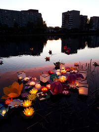 Scenic view of lake against sky at dusk