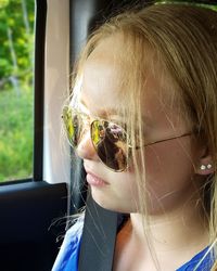 Portrait of woman wearing sunglasses