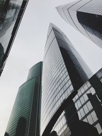 Low angle view of modern buildings against clear sky