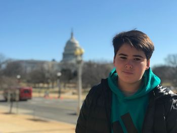 Portrait of boy standing in winter