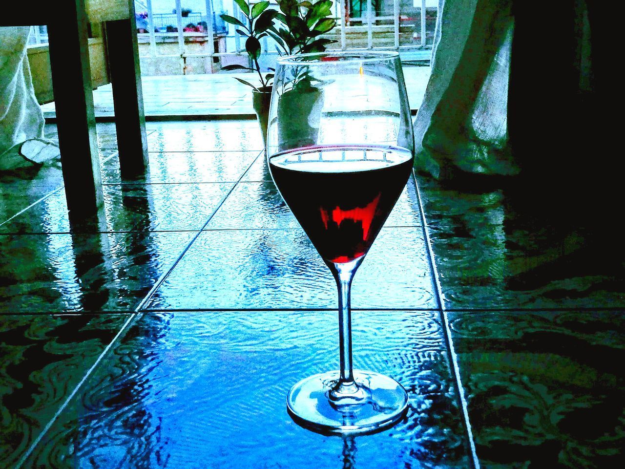 CLOSE-UP OF WINE ON TABLE