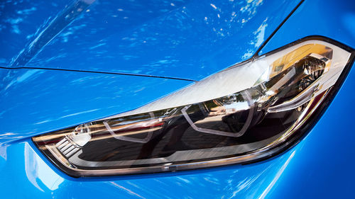 Close-up of vehicle headlight outdoors