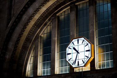 Close-up of clock on window