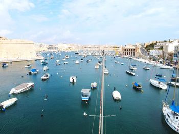 High angle view of boats moored in harbor