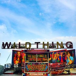 Low angle view of ferris wheel against sky