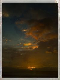 Scenic view of dramatic sky during sunset