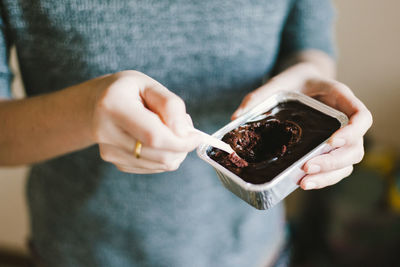 Midsection of man preparing food