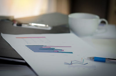 Close-up of graph on desk